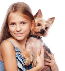 Beautiful blond girl with cute yorkshire terrier dog, isolated