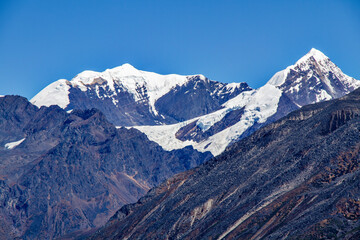 View of snow covered mountains with deep valleys in Arunachal Pradesh in India