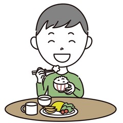 食事をする男の子のイラスト素材