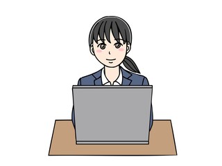 スーツ姿のノートパソコンに向かう女性　正面