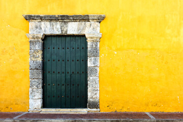 Yellow colonial style wall for a facade in Cartagena, Colombia