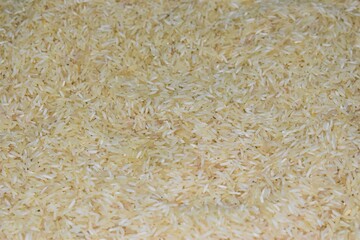 Basmati white rice detail texture background, close up shot of the rice background