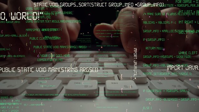 Creative visual of computer programming coding and software development shown by man working on computer keyboard with overlay of computer graphic displaying abstract program codes and computer script