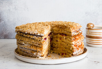 Homemade honey multilayered cake close up. Selective focus