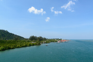 Fototapeta premium Saladan village and mangrove forest when seen from Siri Lanta bridge, is situated in the northern of Koh Lanta Yai, Krabi, Thailand.