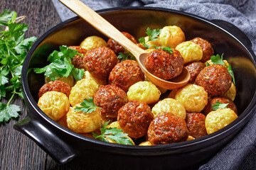 Meatballs and spaghetti balls top view, close-up