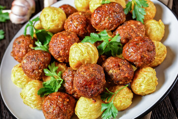 Italian meatballs and pasta balls on a plate
