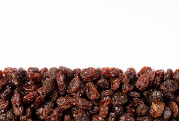 Grape raisin texture in the background.