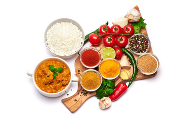 Plate of Traditional Chicken Curry and set of spices on white background
