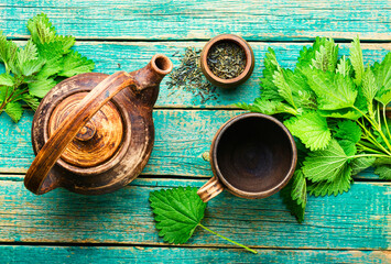 Herbal tea with nettle,wooden table