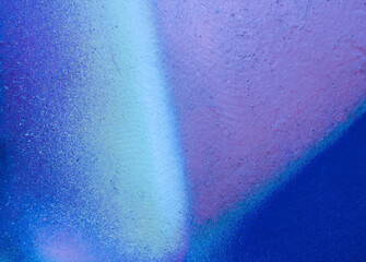 Beautiful bright colorful street art graffiti background. Abstract creative spray drawing fashion colors on the brick walls of the city. Urban Culture gradient texture, copyspace backdrop