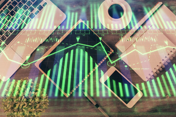 Double exposure of technology theme drawing over work table desktop. Top view. Global data analysis concept.