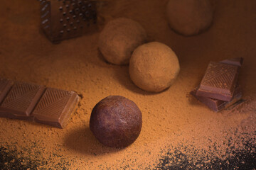 Homemade chocolate Truffles and ingredients. Cocoa dessert making