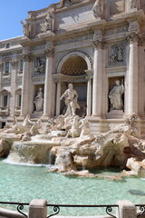 Fototapeta na wymiar ancient monument called Trevi fountain in the center of Rome with the statue of Neptune without tourists due to the coronavirus in Italy