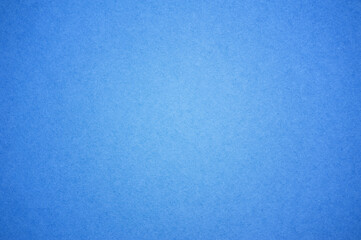 Blue paper background. Place for your text. 