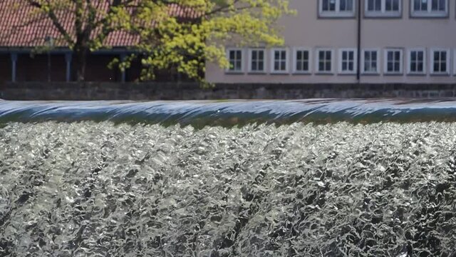 Waterfall on river Weser in city Hamelin in Germany