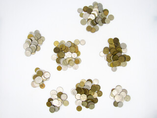A lot of small piles of coins in the Russian currency ruble.