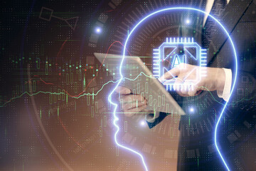 Double exposure of man's hand holding and using a digital device and brain hologram drawing. Data concept.