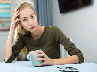 Portrait of a girl suffering from headache