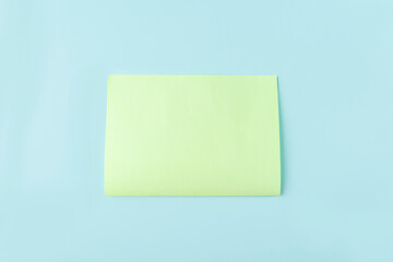 DIY and kids creativity. Step by step instruction: how to make origami paper butterfly. Step 2 bend paper rectangle in half. Children Craft workshop.