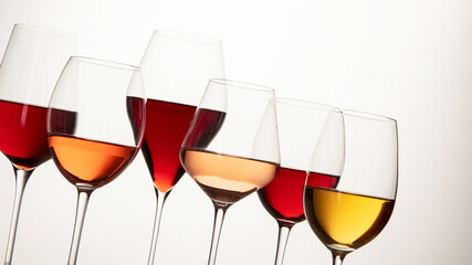 Red, rose and white wine in glasses