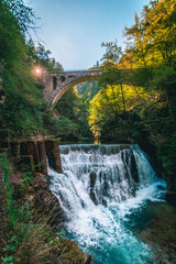 Vintgar gorge waterfall in Slovenia, Triglav national park. Pure fresh water in beautiful nature and forest. Tourist paths near waterfalls
