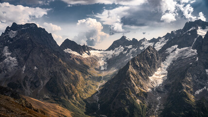 Epic landscape. Magnificent panorama of the Caucasus Mountains. Desktop wallpaper.