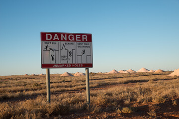  Opal Mining fields in Greater Coober Pedy with danger warning sign.
