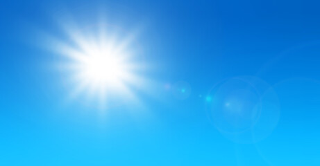 Sun with lens flare and blue sky background