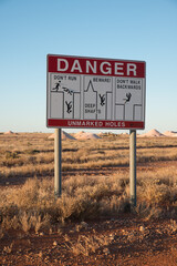  Opal Mining fields in Greater Coober Pedy with danger warning sign.