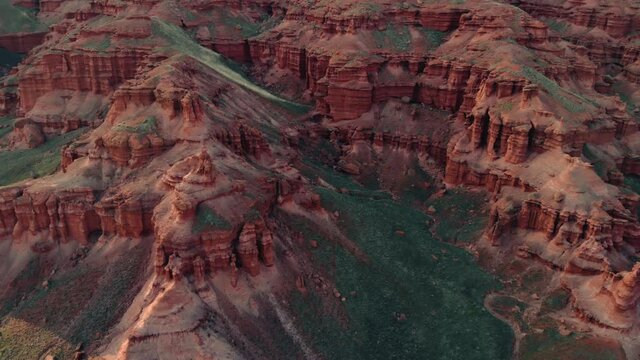 Aerial Drone Fly by Footage of The Red Rocks in Narman - Peribacalari Fairy Chimneys in the Narman province of Erzurum,TURKEY.
