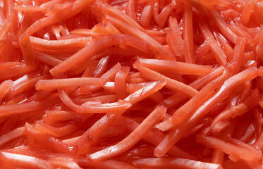Texture of red pickled ginger.
