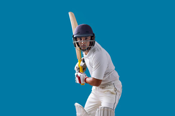  batsman ready to face the ball, isolated over Blue background	