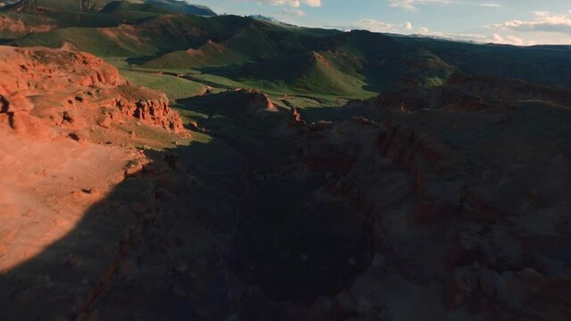 Aerial Drone Extreme Flying in the Red Rocks in Narman - Peribacalari Fairy Chimneys in the Narman province of Erzurum,TURKEY. Aerial freestyle aerobatic View Shot on FPV racing Drone.