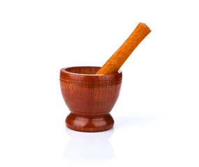 Wooden mortar and pestle on white background