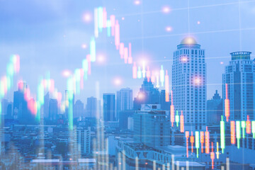 Double exposure of graph Stock market exchange on blurred photo of city scenery background,...