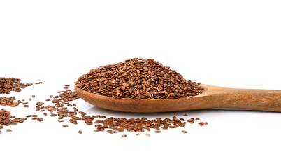 Flax seeds in a wooden spoon isolated on white background.