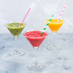 Sicilian Orange, Tangerine and Kiwi fruit smoothie served in martini glass non-alcohol cocktail