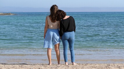 Young Lesbian Women Enjoying the Sea