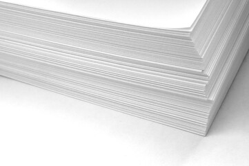 stack of white sheets of paper close-up