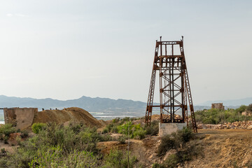 Fototapeta na wymiar Castle of access to an old mining shaft of the Abandoned Mines of Mazarrón. Murcia region. Spain