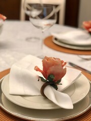 Elegant table setting with rose napking holder ready for a celebration