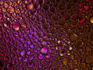 Oil bubbles on the water surface