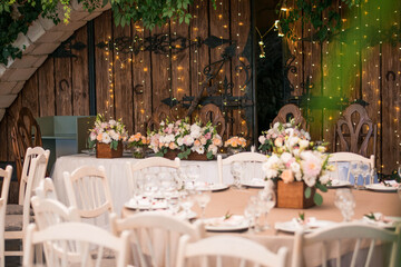 Fototapeta na wymiar Main table at a wedding reception with beautiful flowers