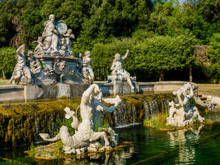 Fototapeta na wymiar Impressive view of the fountain of Ceres, magnificent sculptural composition made using Carrara marble and travertine, Royal Palace of Caserta, Italy