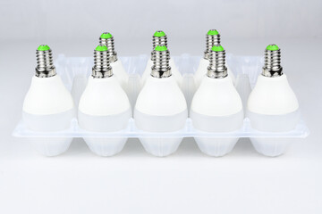 LED energy-saving light bulbs on a white table. ECO energy concept
