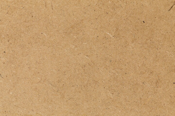 Pressed beige chipboard texture.