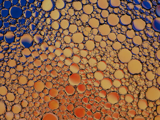 Oil bubbles on the water surface