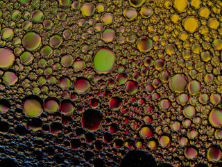Oil bubbles on the water surface