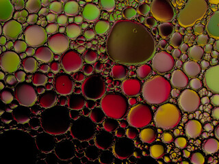 Oil bubbles on the water surface